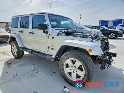 Czwarte zdjęcie samochodu z boku: 2012 JEEP WRANGLER UNLIMITED SAHARA VIN:1C4BJWEG6CL188752 - miniatura