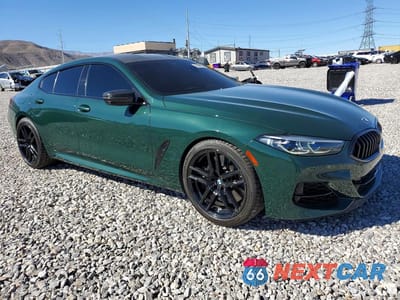 Czwarte zdjęcie samochodu z boku: 2021 BMW M850XI VIN:WBAGV8C00MCF83216 - miniatura