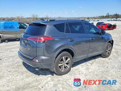Trzecie zdjęcie samochodu z tyłu: 2018 TOYOTA RAV4 XLE VIN:2T3WFREV5JW462813 - miniatura