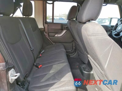 Zdjęcie 11 z 12 samochodu: 2018 JEEP WRANGLER UNLIMITED SAHARA VIN:1C4BJWEG4JL900169 - miniatura