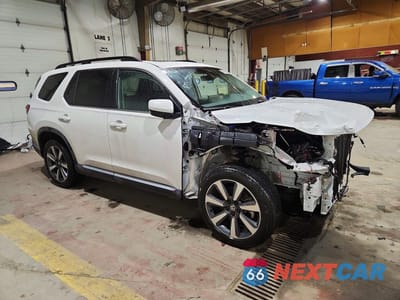 Czwarte zdjęcie samochodu z boku: 2025 HONDA PILOT TOURING VIN:5FNYG1H71SB136700 - miniatura