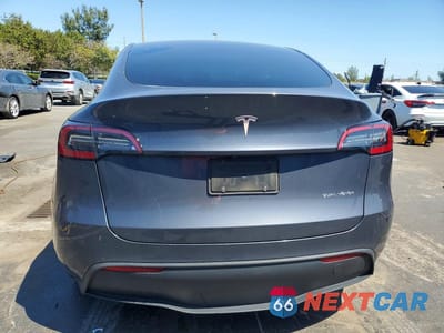 Zdjęcie 6 z 13 samochodu: 2023 TESLA MODEL Y VIN:7SAYGDEE7PA141475 - miniatura