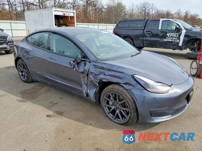 Czwarte zdjęcie samochodu z boku: 2023 TESLA MODEL 3 VIN:5YJ3E1EA9PF680966 - miniatura