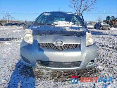 Piąte zdjęcie samochodu w środku: 2011 TOYOTA YARIS BASE VIN:JTDKT4K35B5340829 - miniatura
