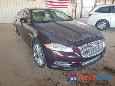 Czwarte zdjęcie samochodu z boku: 2013 JAGUAR XJL PORTFOLIO VIN:SAJWA2GB6DLV40422 - miniatura