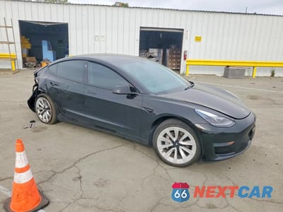 Czwarte zdjęcie samochodu z boku: 2021 TESLA MODEL 3 VIN:5YJ3E1EA7MF927719 - miniatura