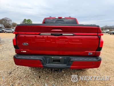 Zdjęcie 6 z 13 samochodu: 2022 FORD F150 LIGHTNING PRO VIN:1FT6W1EV7NWG01462 - miniatura