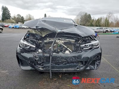 Piąte zdjęcie samochodu w środku: 2021 BMW M340I VIN:3MW5U7J07M8B53324 - miniatura
