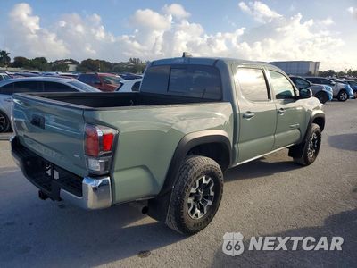 Trzecie zdjęcie samochodu z tyłu: 2023 TOYOTA TACOMA TRD OFF-ROAD VIN:3TYCZ5AN7PT174721 - miniatura