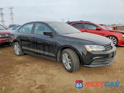 Czwarte zdjęcie samochodu z boku: 2018 VOLKSWAGEN JETTA S VIN:3VW2B7AJ5JM257444 - miniatura