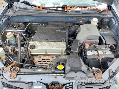 Zdjęcie 12 z 13 samochodu: 2004 MITSUBISHI OUTLANDER LS VIN:JA4LZ31F04U001990 - miniatura