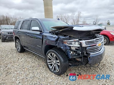 Czwarte zdjęcie samochodu z boku: 2017 CHEVROLET TAHOE C1500 PREMIER VIN:1GNSCCKC0HR219922 - miniatura