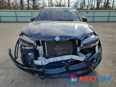Piąte zdjęcie samochodu w środku: 2018 BMW X5 M VIN:5YMKT6C5XJ0Y83186 - miniatura