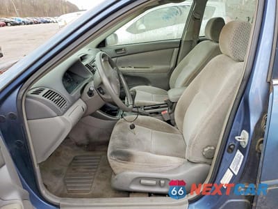 Zdjęcie 7 z 12 samochodu: 2003 TOYOTA CAMRY LE V6 VIN:4T1BF32K13U552655 - miniatura