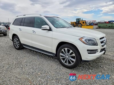 Czwarte zdjęcie samochodu z boku: 2013 MERCEDES-BENZ GL 450 4MATIC VIN:4JGDF7CE5DA143800 - miniatura