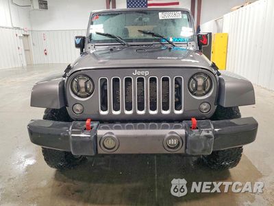Piąte zdjęcie samochodu w środku: 2017 JEEP WRANGLER UNLIMITED SAHARA VIN:1C4BJWEG5HL732598 - miniatura