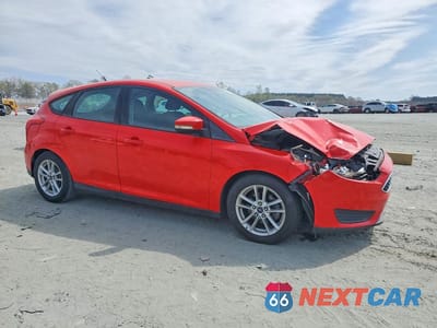 Czwarte zdjęcie samochodu z boku: 2016 FORD FOCUS SE VIN:1FADP3K24GL235173 - miniatura
