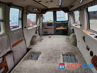 Zdjęcie 10 z 13 samochodu: 1999 CHEVROLET EXPRESS G1500 VIN:1GBFG15R0X1030952 - miniatura