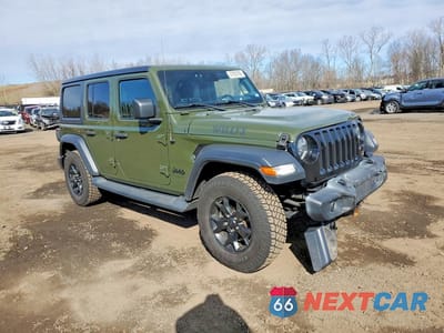 Czwarte zdjęcie samochodu z boku: 2020 JEEP WRANGLER UNLIMITED SPORT VIN:1C4HJXDGXLW282195 - miniatura
