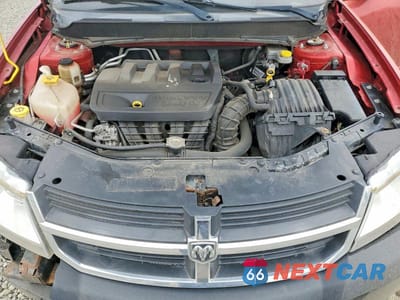 Zdjęcie 11 z 12 samochodu: 2010 DODGE AVENGER R VIN:1B3CC5FB3AN142018 - miniatura