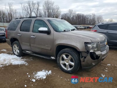 Czwarte zdjęcie samochodu z boku: 2014 CHEVROLET TAHOE K1500 LT VIN:1GNSKBE07ER153220 - miniatura