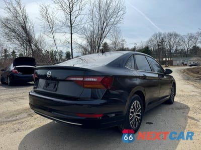 Czwarte zdjęcie samochodu z boku: 2019 VOLKSWAGEN JETTA SEL VIN:3VWE57BU0KM263389 - miniatura