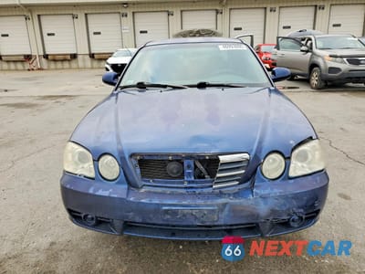 Piąte zdjęcie samochodu w środku: 2005 KIA OPTIMA LX VIN:KNAGD126355405786 - miniatura