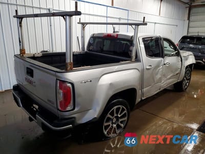 Trzecie zdjęcie samochodu z tyłu: 2016 GMC CANYON SLE VIN:1GTP6CE19G1383229 - miniatura
