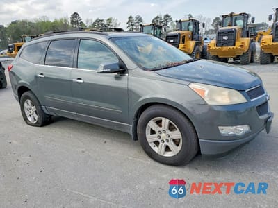 Czwarte zdjęcie samochodu z boku: 2011 CHEVROLET TRAVERSE LT VIN:1GNKRJED2BJ111928 - miniatura