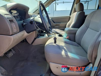 Zdjęcie 7 z 13 samochodu: 2003 JEEP GRAND CHEROKEE LAREDO VIN:1J4GW48S23C602129 - miniatura