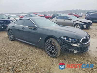 Czwarte zdjęcie samochodu z boku: 2020 BMW M850XI VIN:WBAGV8C08LCE44966 - miniatura