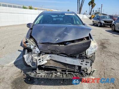 Piąte zdjęcie samochodu w środku: 2015 TOYOTA PRIUS TWO VIN:JTDKN3DU8F0480435 - miniatura