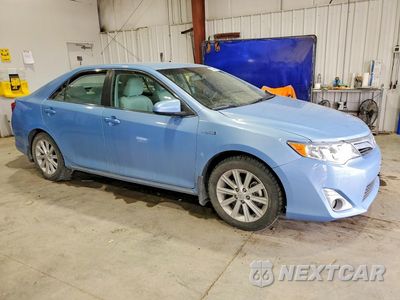 Czwarte zdjęcie samochodu z boku: 2012 TOYOTA CAMRY HYBRID XLE VIN:4T1BD1FKXCU031180 - miniatura