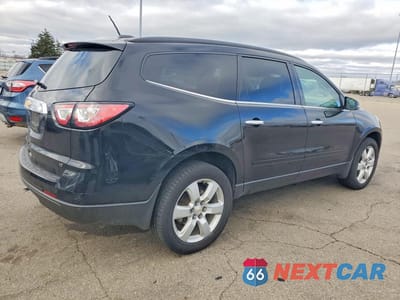 Trzecie zdjęcie samochodu z tyłu: 2017 CHEVROLET TRAVERSE LT VIN:1GNKRGKD4HJ185268 - miniatura