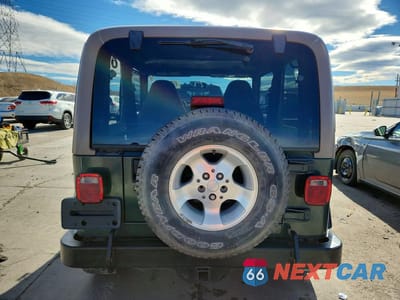Zdjęcie 6 z 13 samochodu: 2002 JEEP WRANGLER / TJ SPORT VIN:1J4FA49S32P731769 - miniatura