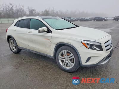 Czwarte zdjęcie samochodu z boku: 2015 MERCEDES-BENZ GLA 250 VIN:WDCTG4EB2FJ178774 - miniatura