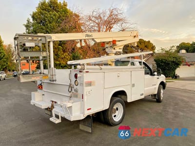 Czwarte zdjęcie samochodu z boku: 1999 FORD F-450 CONSTRUCTION TRUCKS BUCKET TRUCK VIN:1FDXF46S2XEE14161 - miniatura