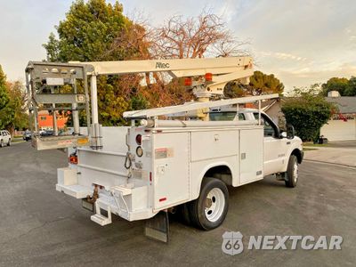 Czwarte zdjęcie samochodu z boku: 1999 FORD F-450 CONSTRUCTION TRUCKS BUCKET TRUCK VIN:1FDXF46S2XEE14161 - miniatura