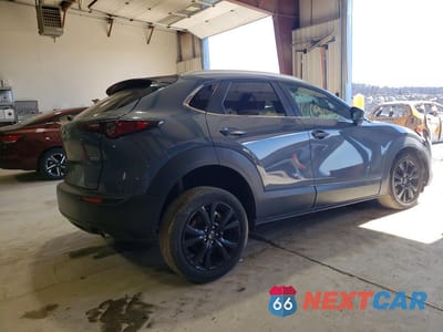 Trzecie zdjęcie samochodu z tyłu: 2024 MAZDA CX-30 PREFERRED VIN:3MVDMBCM6RM705894 - miniatura