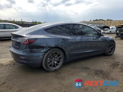 Trzecie zdjęcie samochodu z tyłu: 2022 TESLA MODEL 3 VIN:5YJ3E1EB1NF173324 - miniatura