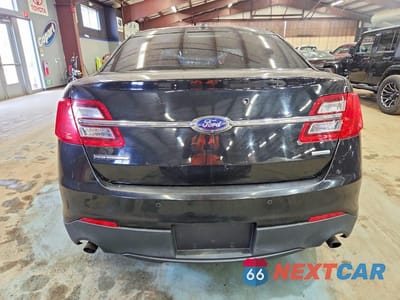 Zdjęcie 6 z 11 samochodu: 2014 FORD TAURUS POLICE INTERCEPTOR VIN:1FAHP2MT9EG100052 - miniatura