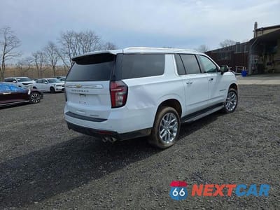 Czwarte zdjęcie samochodu z boku: 2024 CHEVROLET SUBURBAN K1500 PREMIER VIN:1GNSKFKL1RR308842 - miniatura