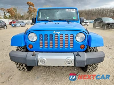Piąte zdjęcie samochodu w środku: 2011 JEEP WRANGLER UNLIMITED SAHARA VIN:1J4HA5H12BL632987 - miniatura