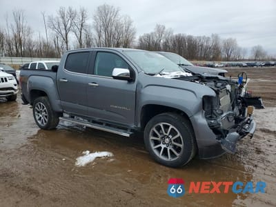 Czwarte zdjęcie samochodu z boku: 2022 GMC CANYON DENALI VIN:1GTG6EEN0N1226409 - miniatura