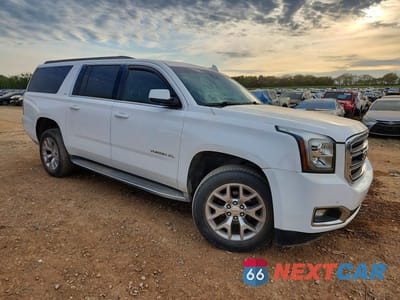 Czwarte zdjęcie samochodu z boku: 2015 GMC YUKON XL C1500 SLT VIN:1GKS1HKC3FR568991 - miniatura