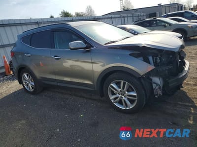 Czwarte zdjęcie samochodu z boku: 2014 HYUNDAI SANTA FE SPORT 2.0T VIN:5XYZU3LA7EG185229 - miniatura