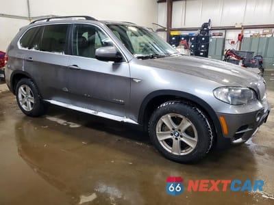 Czwarte zdjęcie samochodu z boku: 2011 BMW X5 XDRIVE50I VIN:5UXZV8C56BL420411 - miniatura