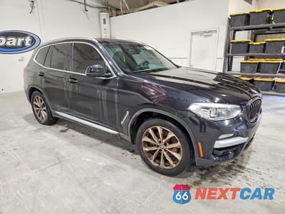 Czwarte zdjęcie samochodu z boku: 2019 BMW X3 SDRIVE30I VIN:5UXTR7C54KLF32518 - miniatura