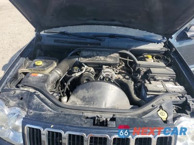 Zdjęcie 12 z 13 samochodu: 2007 JEEP GRAND CHEROKEE LAREDO VIN:1J8GR48K17C638311 - miniatura