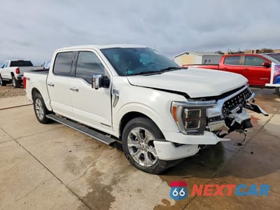 Czwarte zdjęcie samochodu z boku: 2023 FORD F150 SUPERCREW VIN:1FTFW1ED7PFA09957 - miniatura